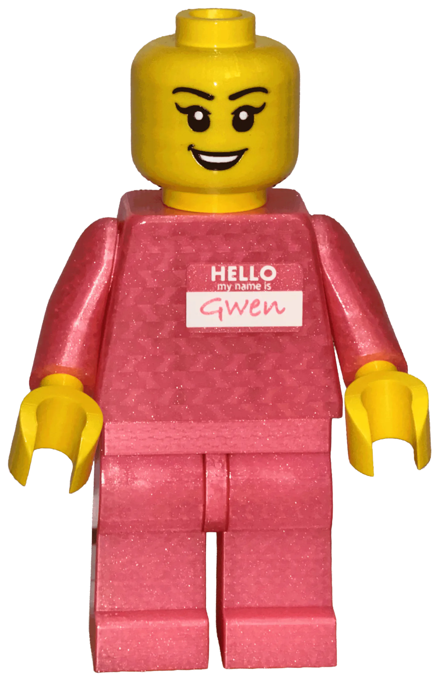 A custom Mega Figure in pink sparkle filament with a smiling female face and a name tag on the chest reading Hello my name is Gwen